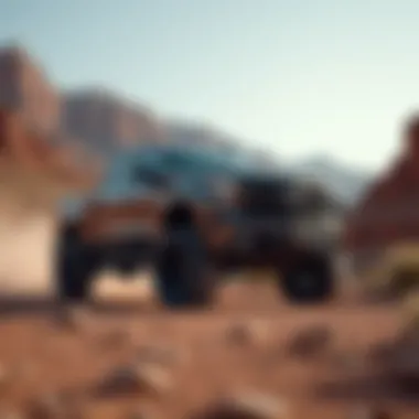 Chevy Silverado parked in front of a rugged landscape with large tires