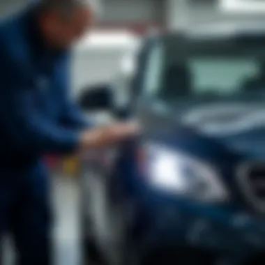 Professional technician repairing a car dent