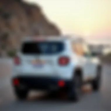 Rear view of the White Jeep Renegade Trailhawk emphasizing its stylish design